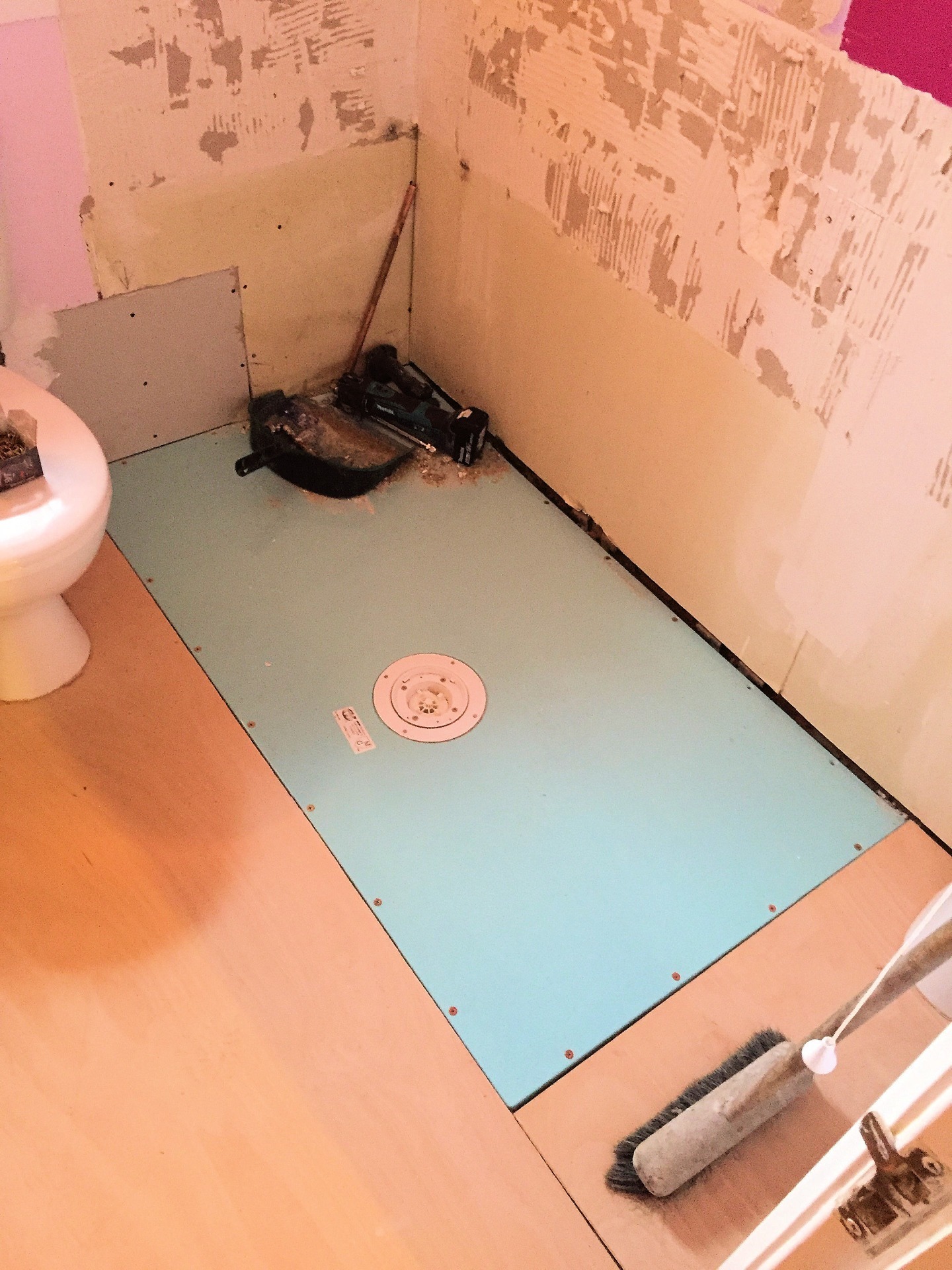 Bathroom flooring replaced to suit new Altro waterproof non slip surface, and wet room drainage point installed.