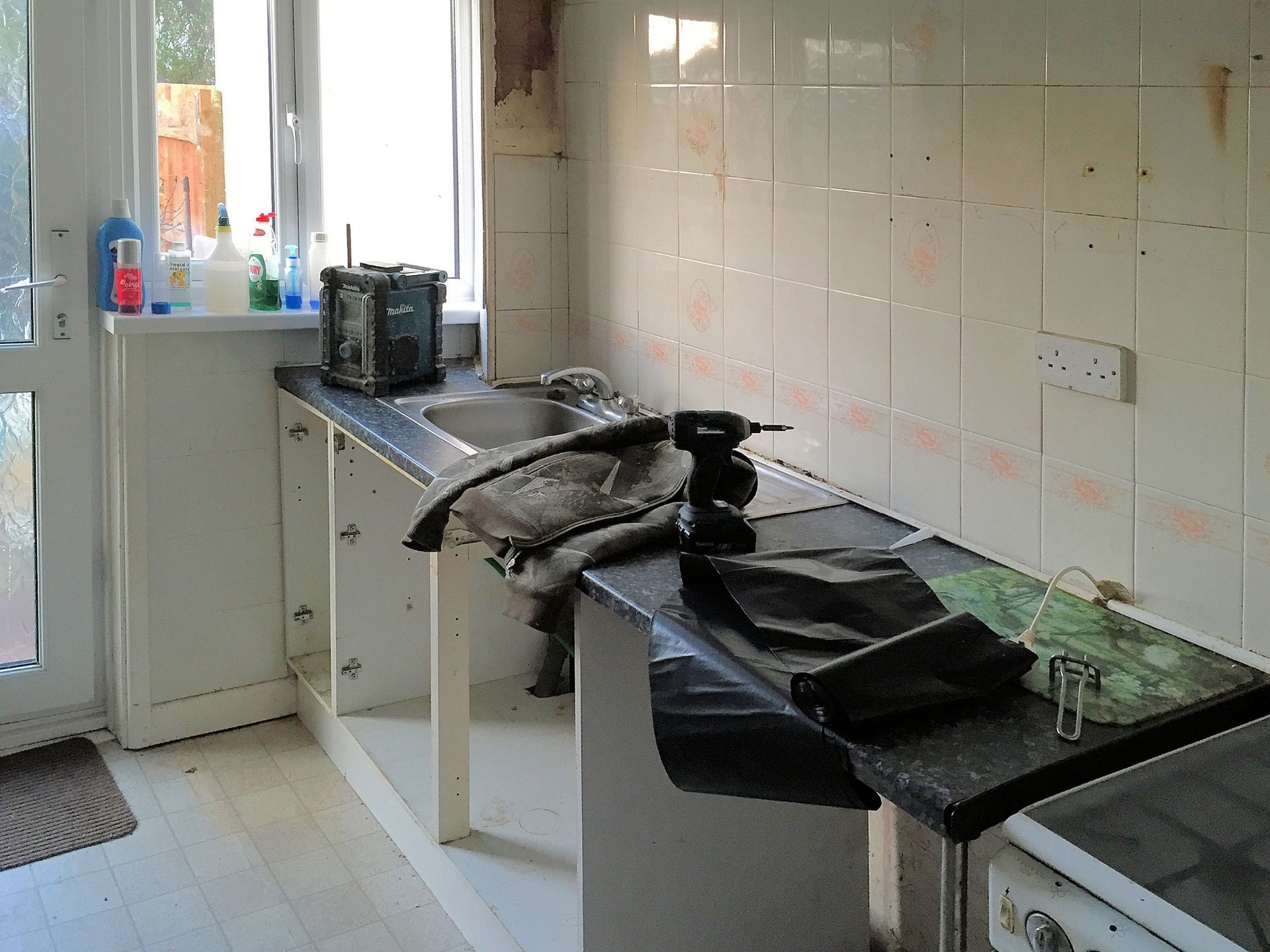 Kitchen Refurbishment, removal of old units and wall tiles. Barnstaple Devon