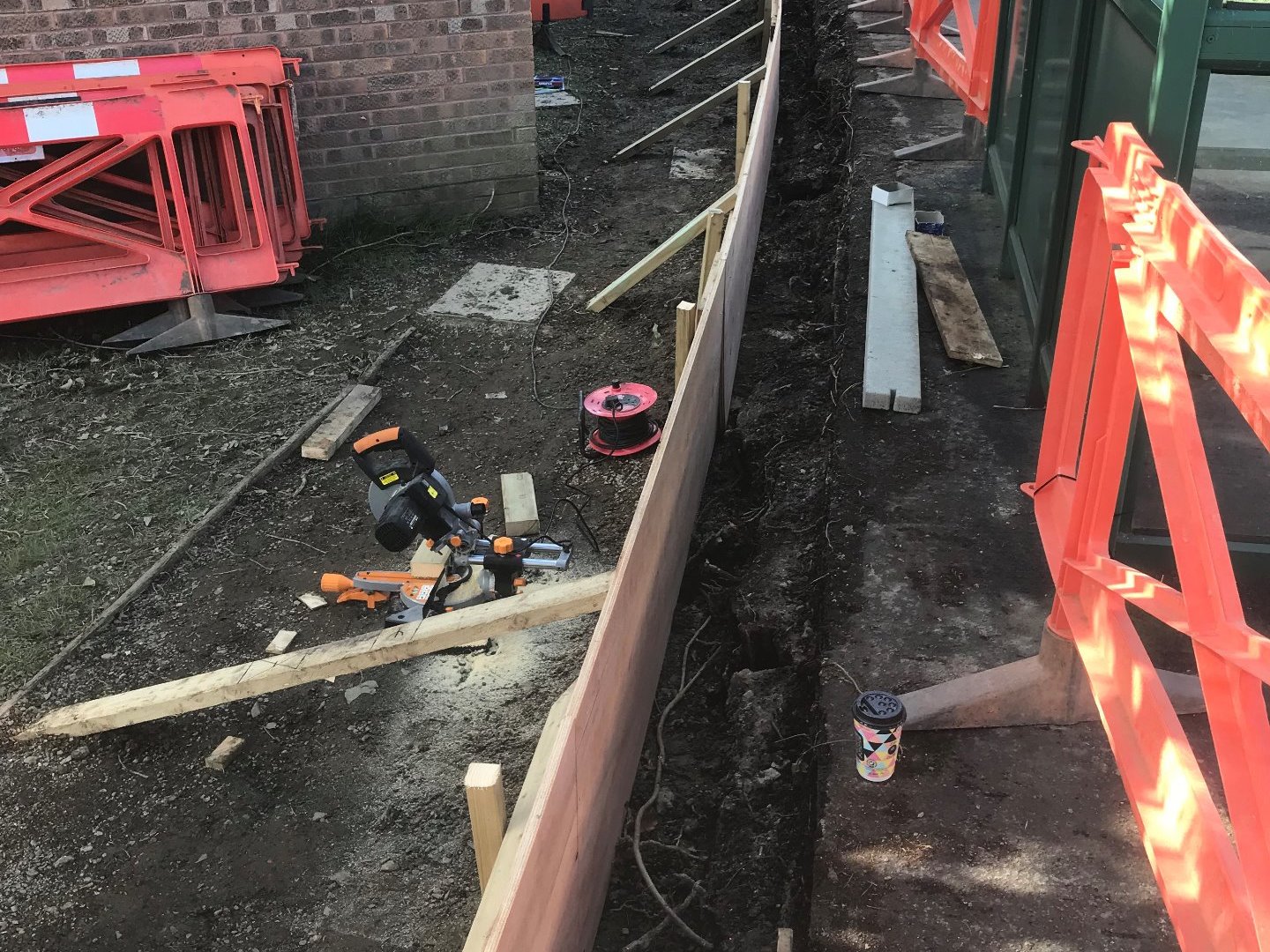 Installation of shuttering form work for concrete ring beam.