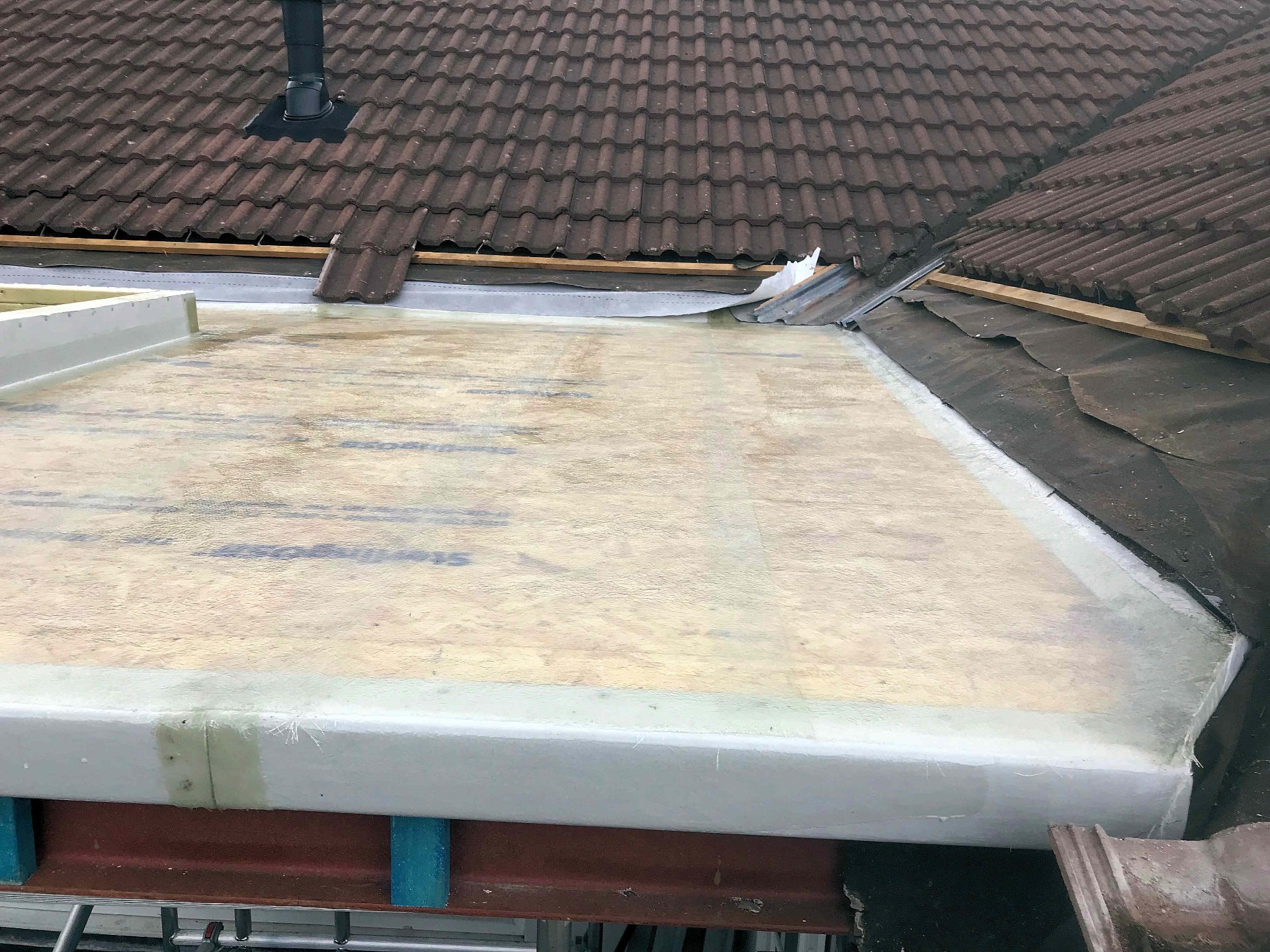 Twin layer fibreglass matting and resin installed, North Devon