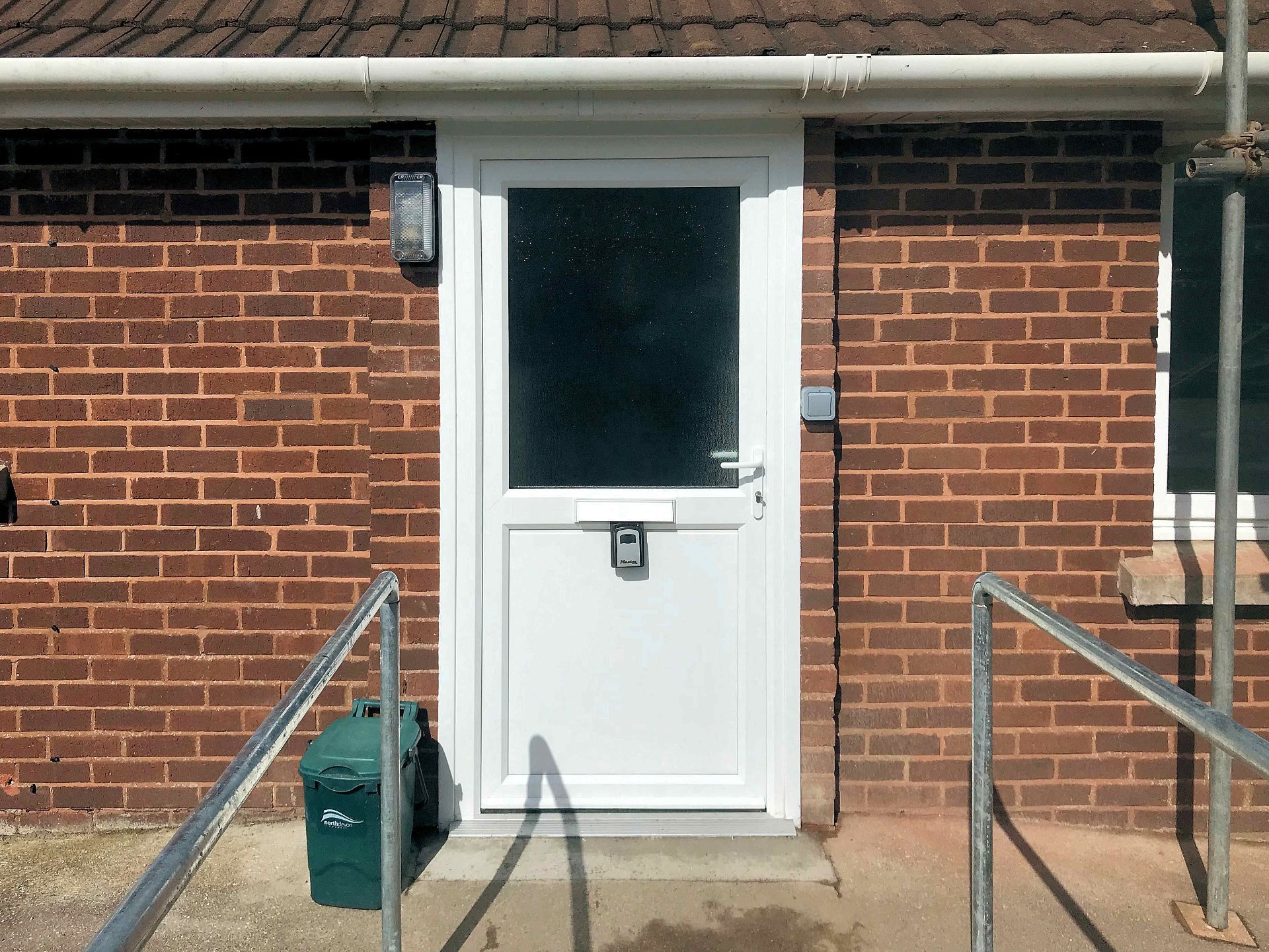New uPVC front door widened for easy disabled access along with hand rails and outside lighting. North Devon