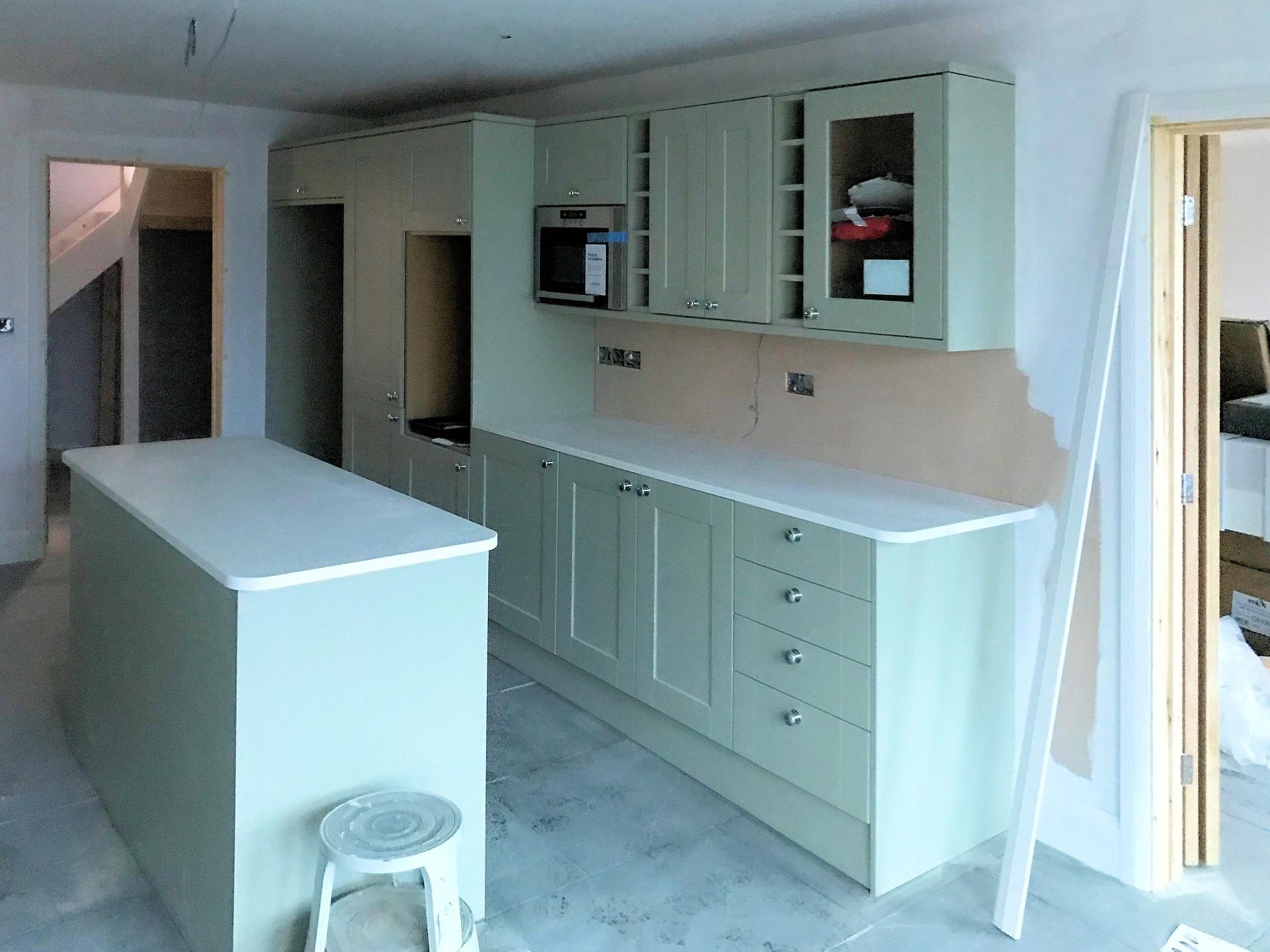 Kitchen with Island, all acrylic worktop edges routered off and rounded and polished