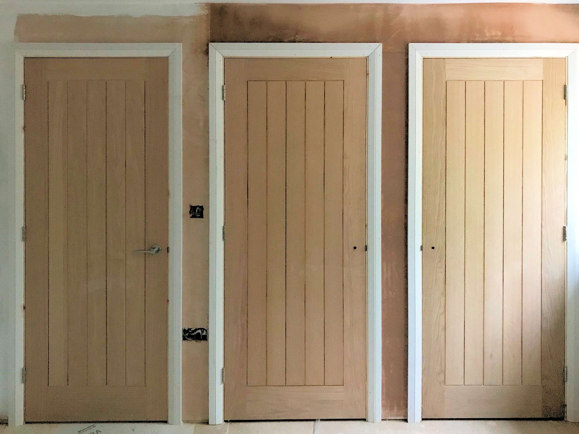 Doors and Built in Cupboards, Hidden walk-in wardrobe doors spaced to even out gaps between room entrance and wardrobes., Barnstaple North Devon