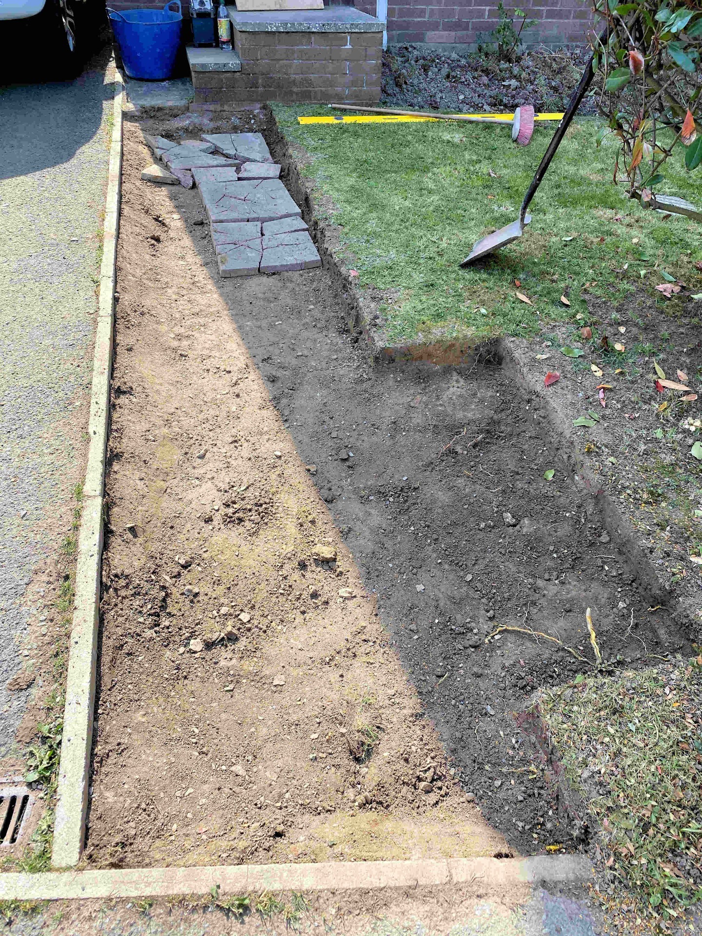 Patio Wall Path. Remove old slabs and soil removed for 150mm hardcore. Barnstaple North Devon