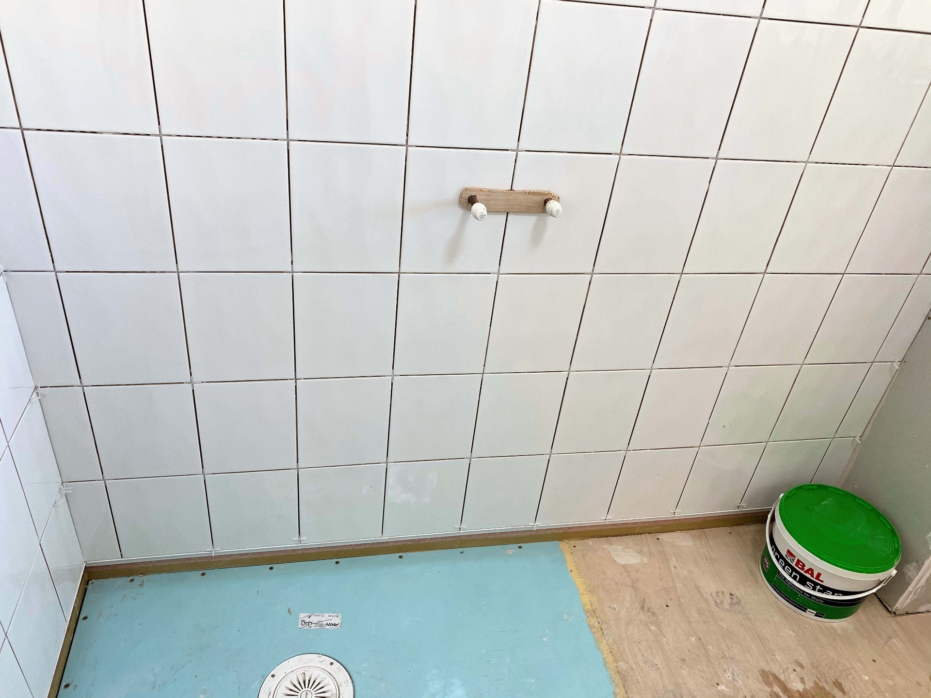 Bathroom to Wet Room; Tiled walls with bar mixer pipework spaced. Barnstaple North Devon