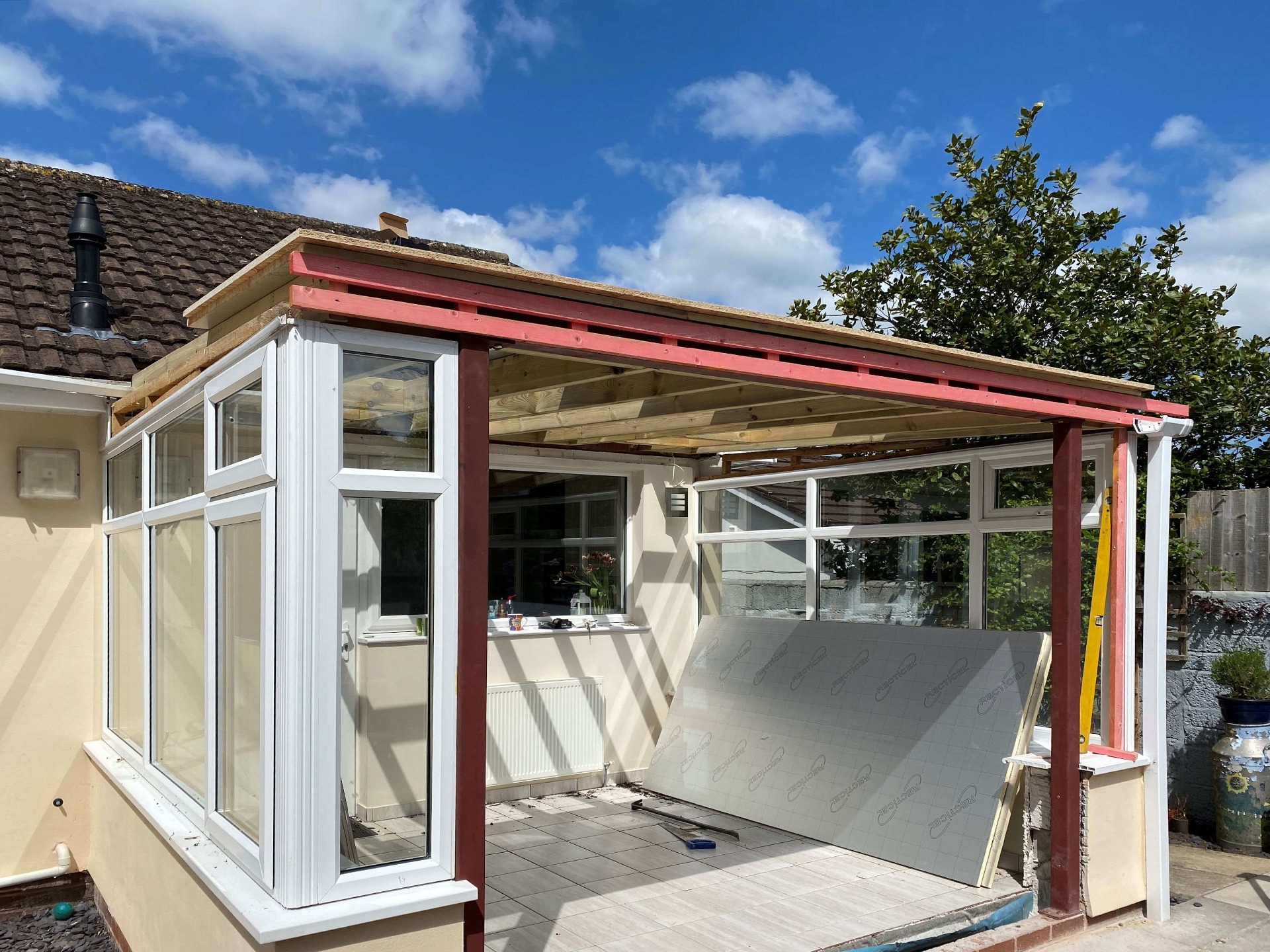 Install insulation to underside of new fibreglass roof Conservatory. Barnstaple North Devon